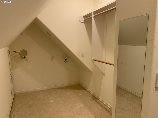 spacious closet featuring lofted ceiling