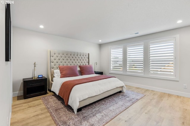 bedroom featuring light wood-type flooring