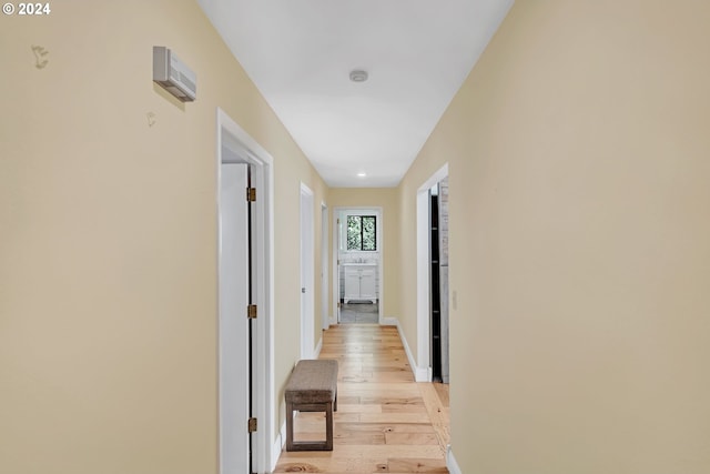 hallway featuring light wood-type flooring