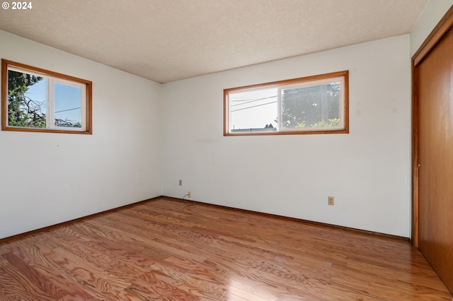 unfurnished bedroom featuring light hardwood / wood-style flooring