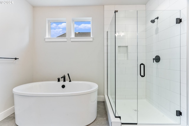 bathroom with independent shower and bath