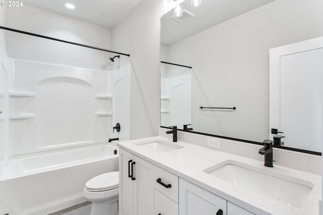 full bathroom featuring toilet,  shower combination, and vanity