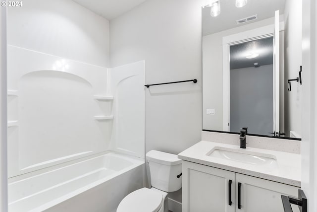 full bathroom featuring vanity, toilet, and bathing tub / shower combination