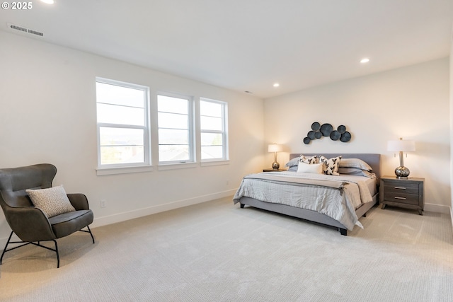 bedroom with light carpet