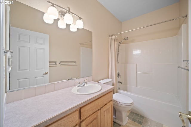 full bathroom with vanity, toilet, and shower / bath combo with shower curtain