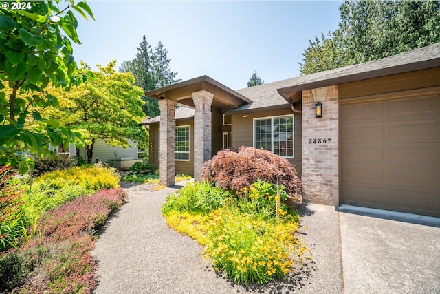 property entrance featuring a garage