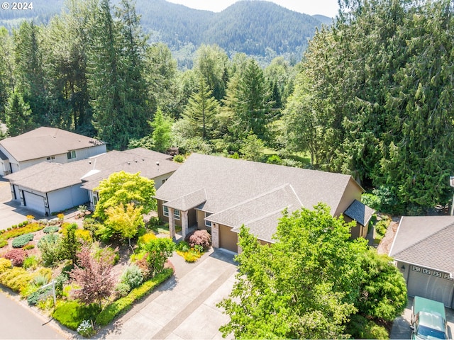 birds eye view of property featuring a mountain view