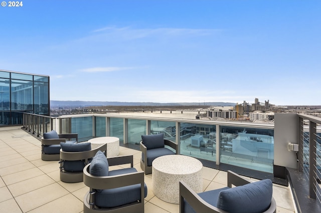 view of patio featuring a balcony