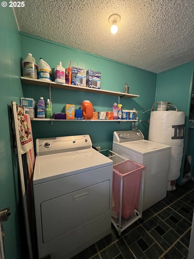 304 SE Hillcrest Dr, John Day, OR 97845 - laundry room featuring separate washer and dryer, water heater, a textured ceiling, and tile patterned floors