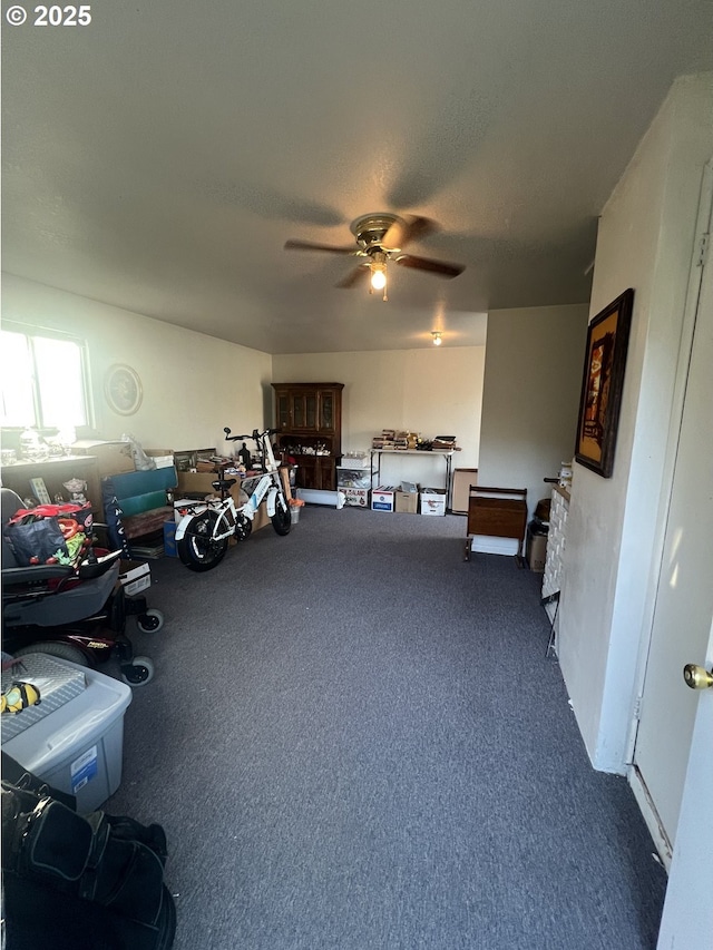 304 SE Hillcrest Dr, John Day, OR 97845 - misc room with ceiling fan and dark carpet