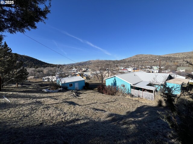 exterior space featuring a mountain view