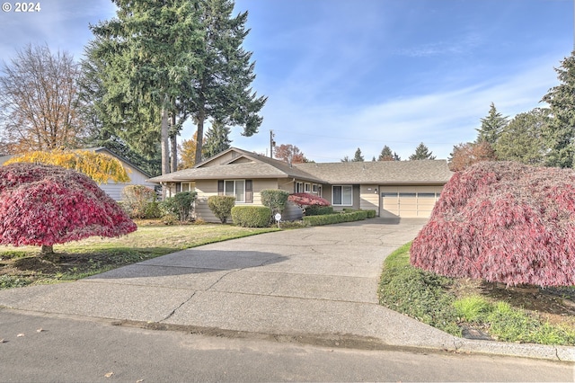 ranch-style home with a garage