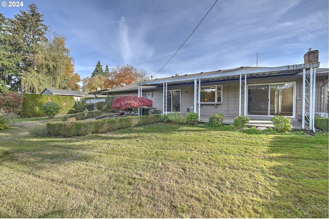 exterior space featuring a lawn