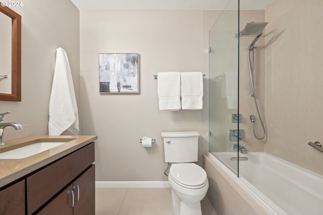 full bathroom featuring tile patterned floors, vanity, bath / shower combo with glass door, and toilet