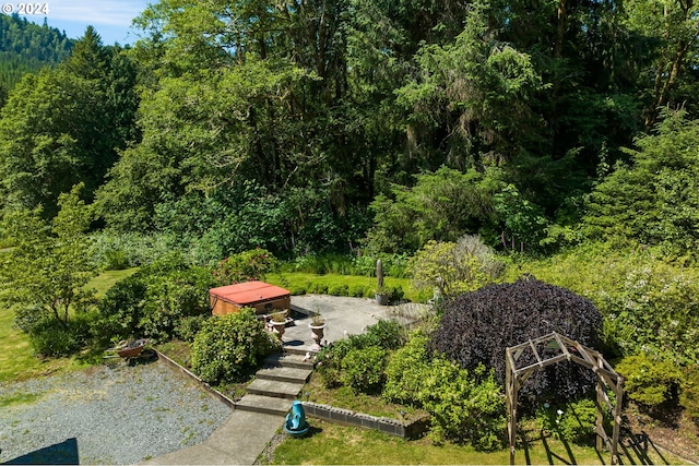 view of property's community featuring a patio