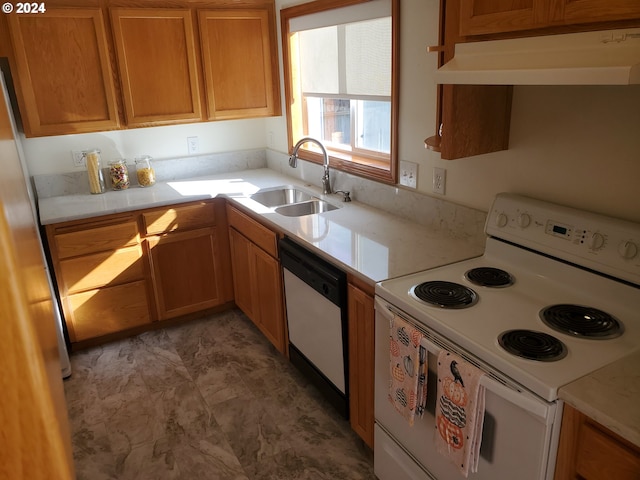 kitchen with white appliances and sink