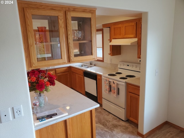 kitchen featuring sink and white appliances