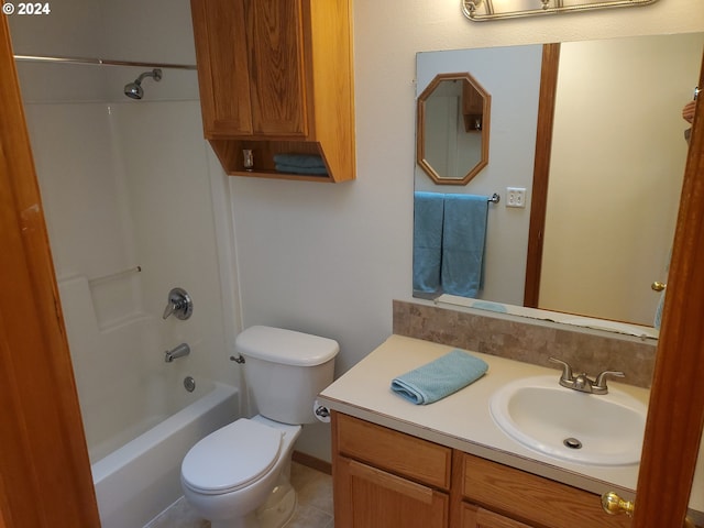 full bathroom featuring vanity, shower / washtub combination, toilet, and tile patterned floors