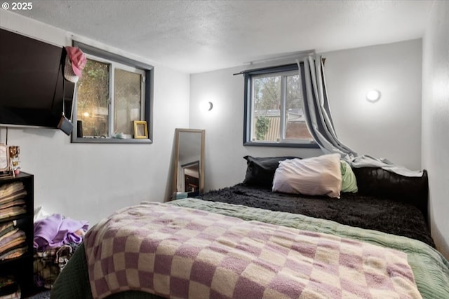 bedroom featuring a textured ceiling