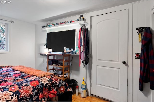 bedroom featuring light wood-type flooring