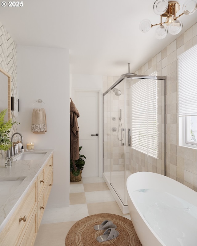 bathroom with vanity and separate shower and tub