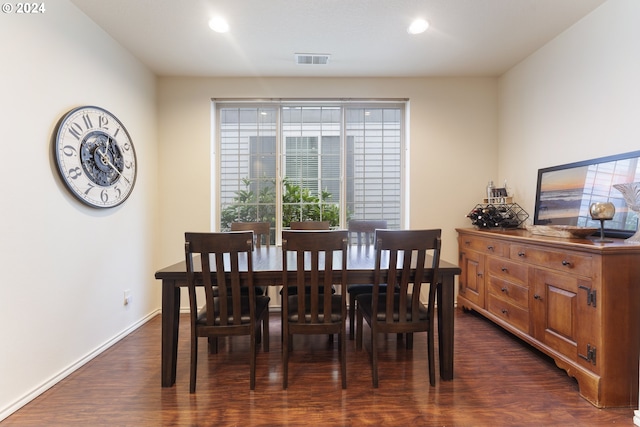 dining room featuring dark hardwood / wood-style flooring