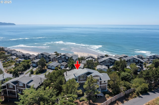 aerial view with a view of the beach and a water view