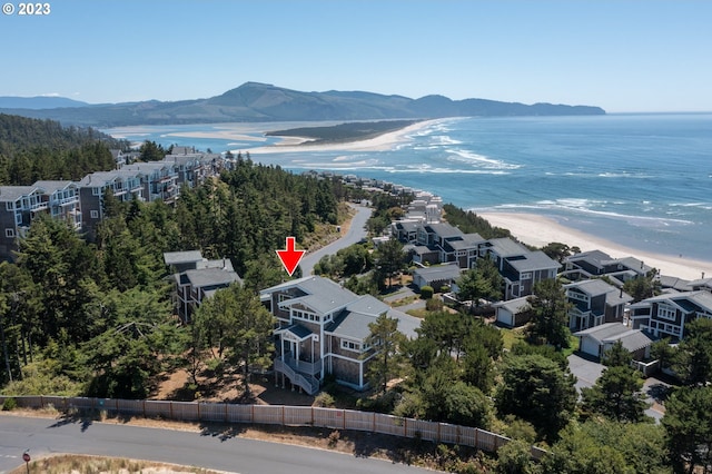 bird's eye view featuring a beach view and a water and mountain view