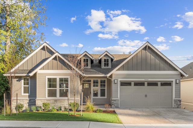 craftsman-style house with a front lawn and a garage