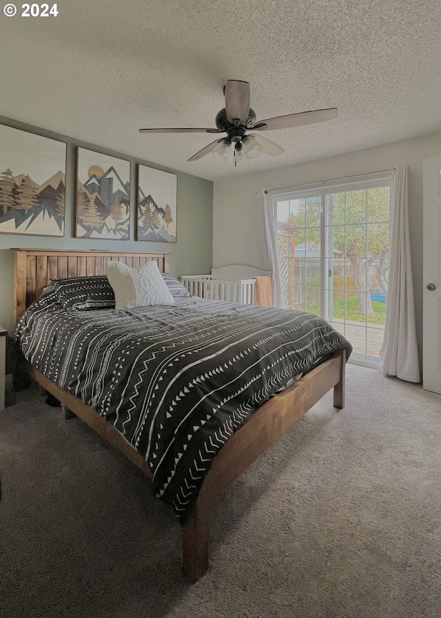 bedroom with access to outside, a textured ceiling, ceiling fan, and carpet