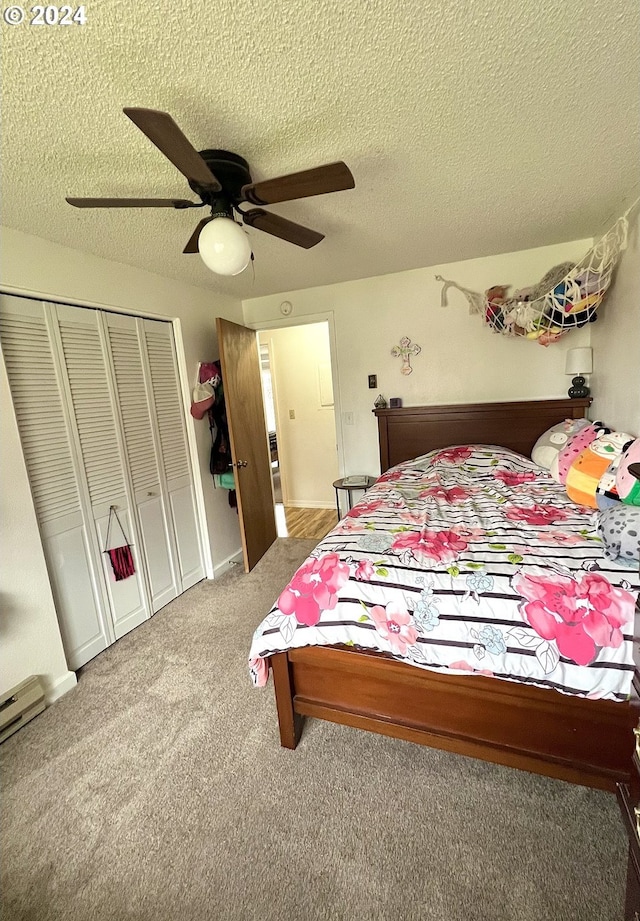 bedroom featuring a closet, carpet, a textured ceiling, and ceiling fan