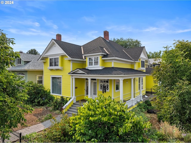 victorian home featuring covered porch