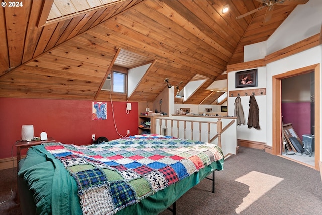 bedroom featuring wooden ceiling, lofted ceiling with skylight, and carpet floors