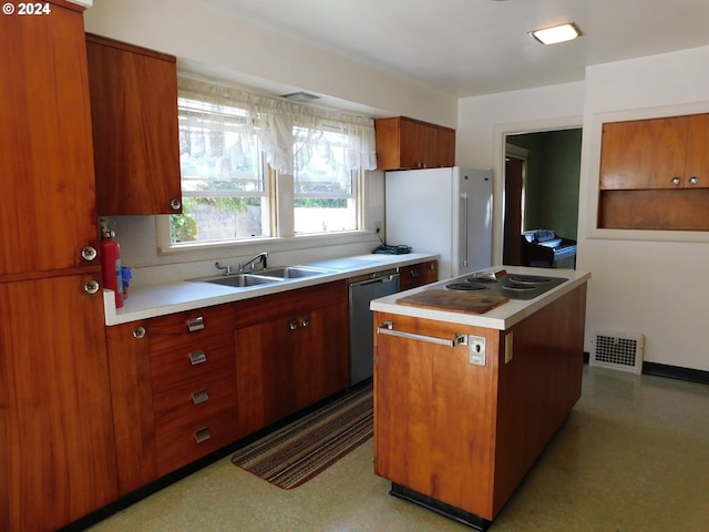 kitchen featuring stainless steel electric cooktop, sink, white refrigerator, black dishwasher, and a kitchen island