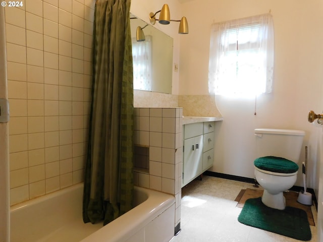 full bathroom with vanity, toilet, and shower / bathtub combination with curtain