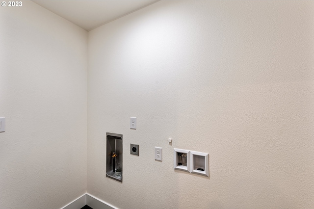 clothes washing area featuring washer hookup, hookup for an electric dryer, and gas dryer hookup