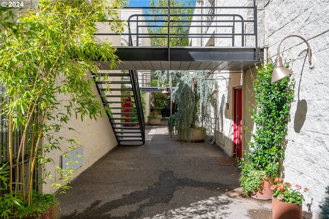 view of patio featuring a balcony