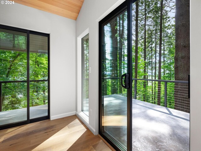 4731 SW 18th Dr, Portland, OR 97239 - doorway featuring lofted ceiling, hardwood / wood-style floors, and wood ceiling