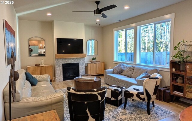 kitchen featuring appliances with stainless steel finishes, decorative light fixtures, sink, tasteful backsplash, and a wealth of natural light