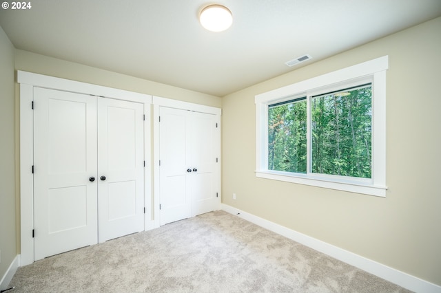 clothes washing area with gas dryer hookup, hookup for an electric dryer, cabinets, and washer hookup