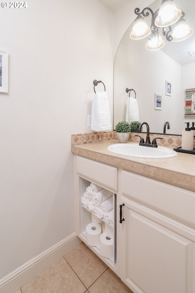 bathroom with vanity and tile patterned flooring