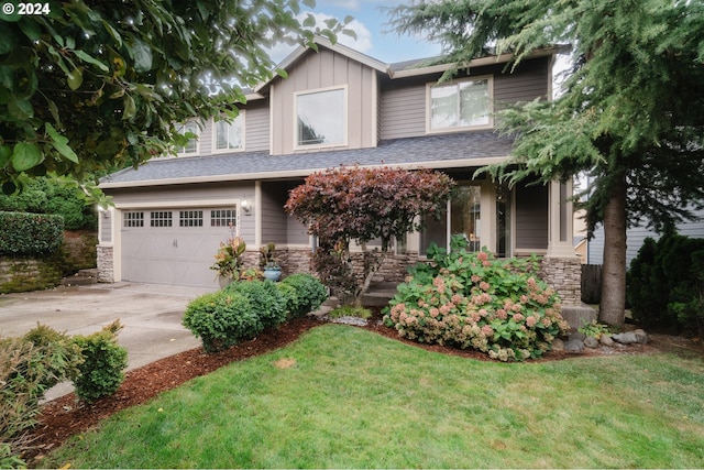 craftsman inspired home with a front yard, a porch, and a garage