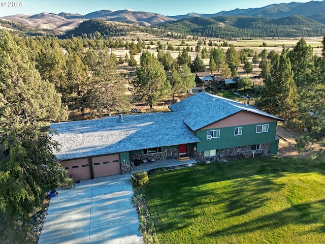 bird's eye view with a mountain view