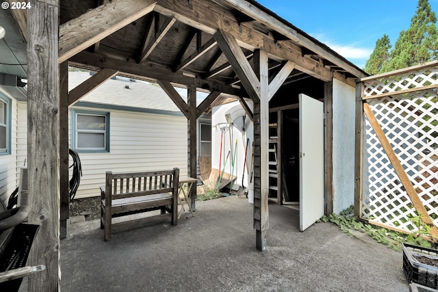 view of patio / terrace featuring fence