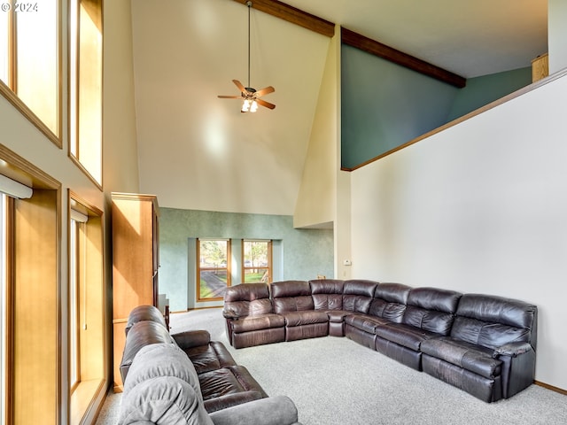 living room featuring high vaulted ceiling, carpet floors, and ceiling fan