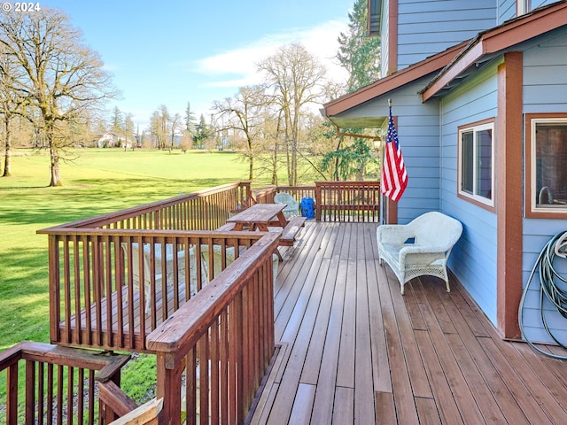 wooden deck with a yard