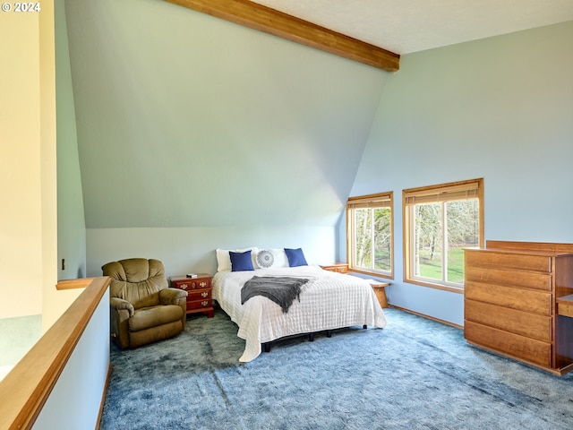 bedroom featuring carpet and lofted ceiling with beams