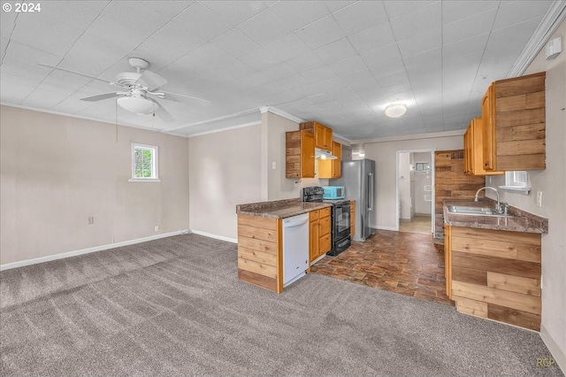 kitchen featuring stainless steel appliances, sink, ornamental molding, ceiling fan, and dark carpet