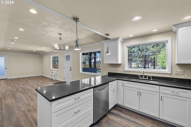 52582 Doe Ln, La Pine, OR 97739 - kitchen with stainless steel dishwasher, a sink, a peninsula, recessed lighting, and white cabinetry