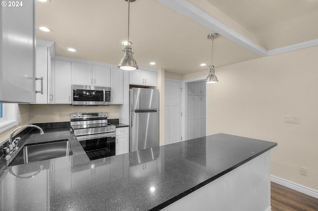 52582 Doe Ln, La Pine, OR 97739 - kitchen with white cabinets, a sink, dark stone countertops, stainless steel appliances, and recessed lighting